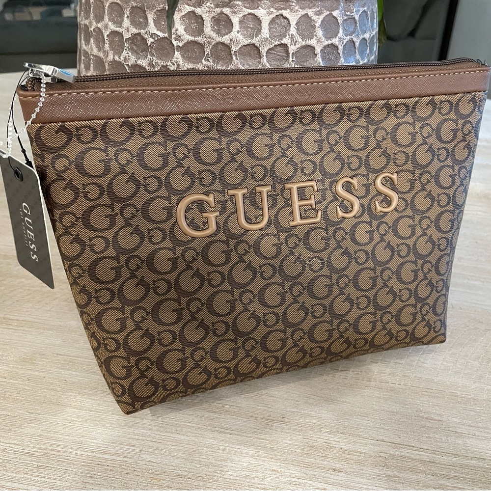 Brand new Guess cosmetic travel bag